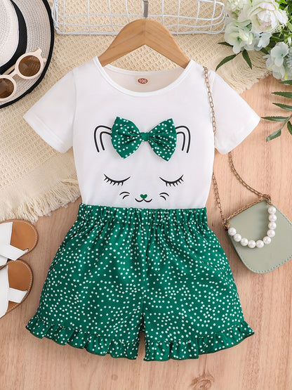 2pcs Girls Cute Cat Graphic Bow T-Shirts Round Neck Short Sleeve Tees Top & Elastic Waist Polka Dots Ruffled Hem Shorts Set Kids Summer Clothes