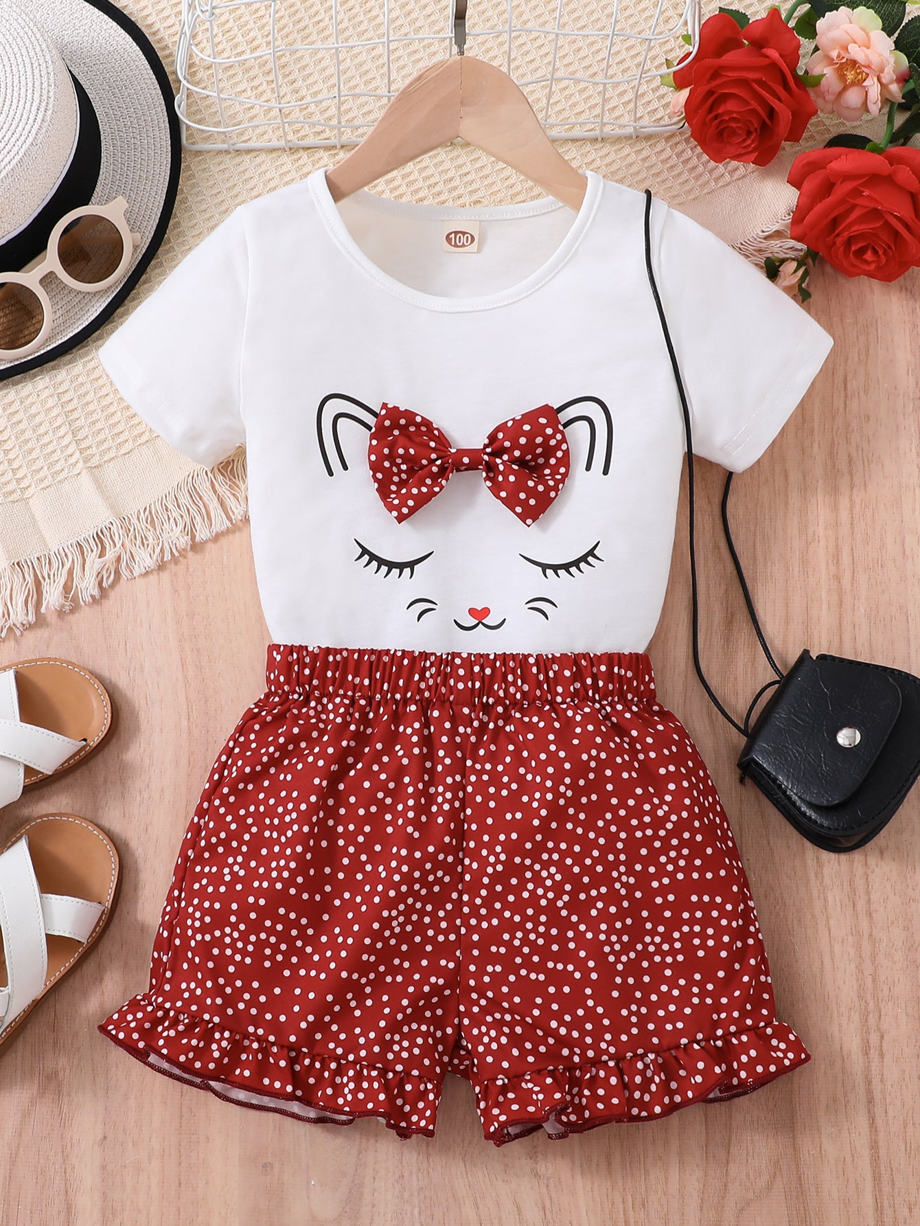 2pcs Girls Cute Cat Graphic Bow T-Shirts Round Neck Short Sleeve Tees Top & Elastic Waist Polka Dots Ruffled Hem Shorts Set Kids Summer Clothes