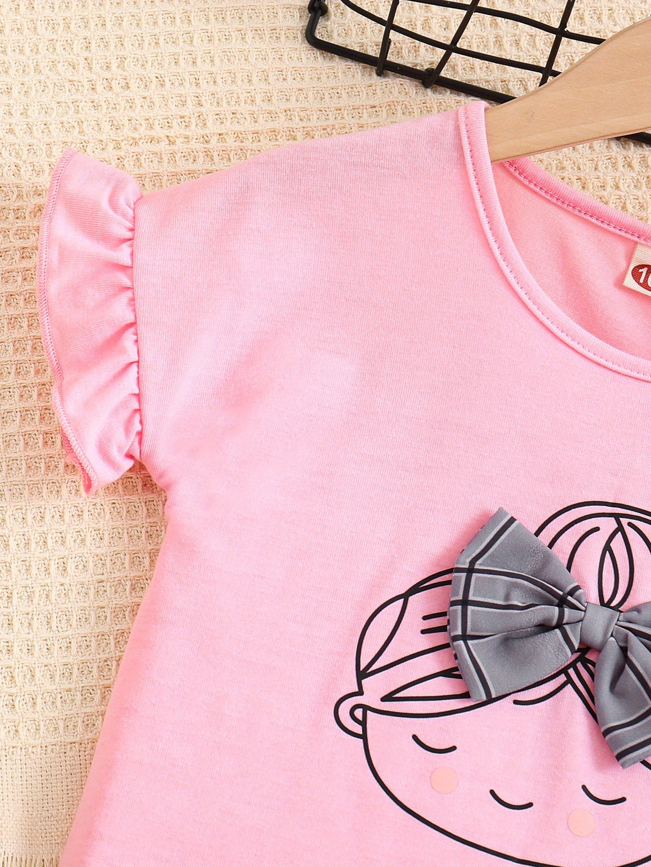 2pcs Girls Figure Graphic T-Shirts Round Neck Ruffle Sleeve Tees Top & Elastic Waist Bow Plaid Shorts Set Kids Summer Clothes