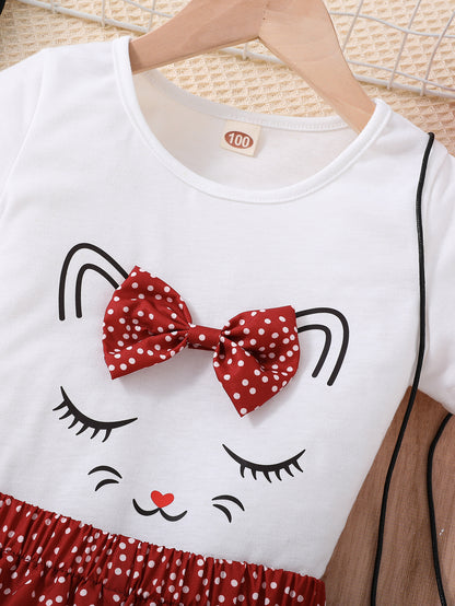 2pcs Girls Cute Cat Graphic Bow T-Shirts Round Neck Short Sleeve Tees Top & Elastic Waist Polka Dots Ruffled Hem Shorts Set Kids Summer Clothes